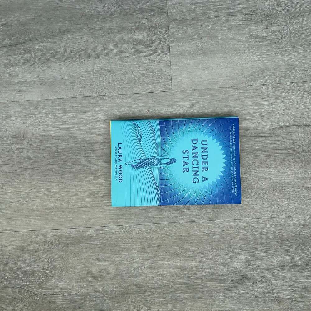 Under a Dancing Star by Laura Wood (Hardcover Book)